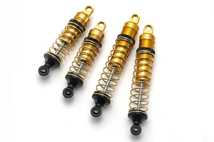 Equipped with gold anodised oil-filled shocks resembling the pressure shocks that dominated the era. Dial adjustment allows easy vehicle height tuning for precision chassis settings.