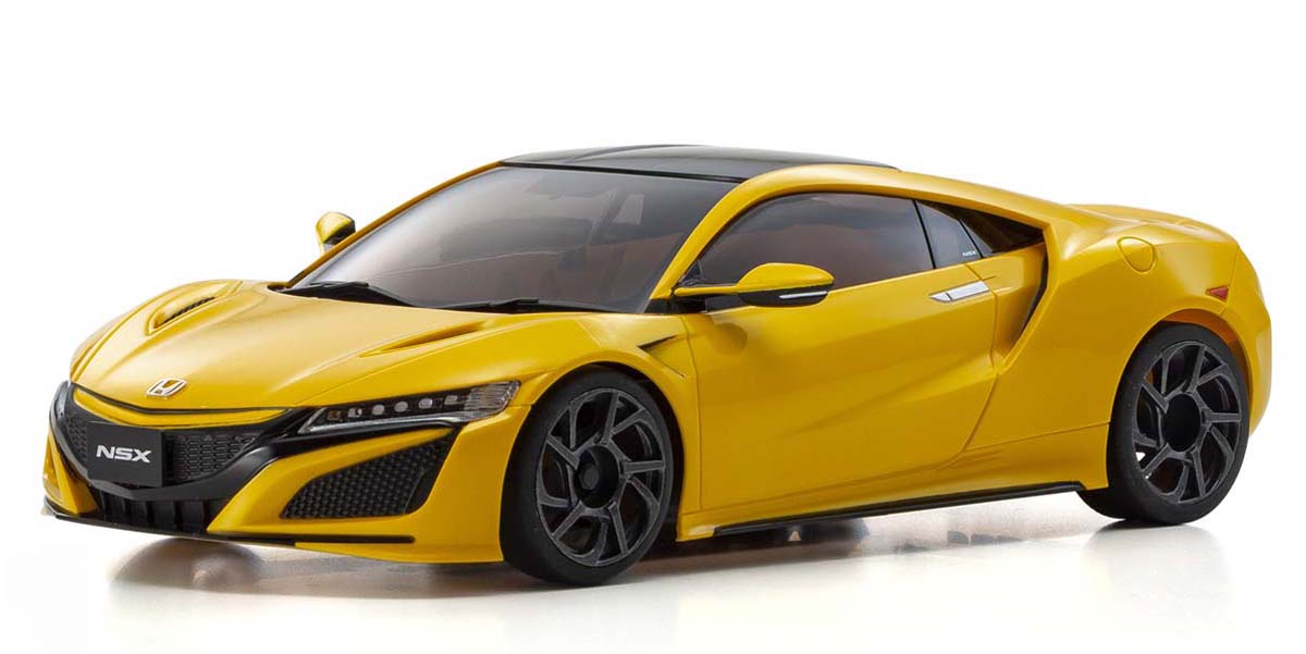 The NSX design is said to be the embodiment of power and light. Kyosho recreates the wide and low aerodynamics of the distinctive flowing form.