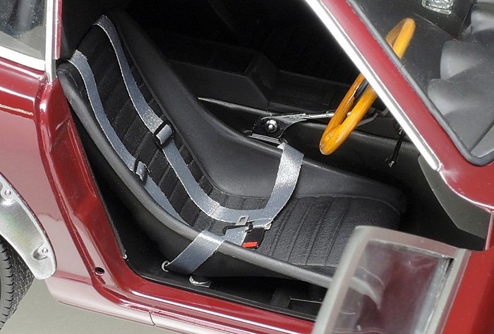 A racy seatbelt and photo-etched buckle parts provide a great finish when installing the bucket seat.