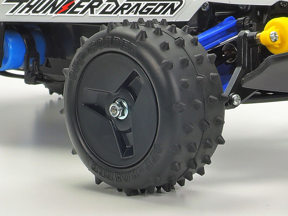 Dish design wheels help mud and dirt to slide right off, and are paired with grippy spike tires.